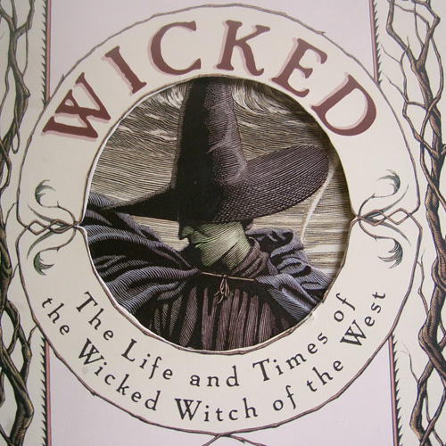 this book features a wizard wearing a wide brimmed hat