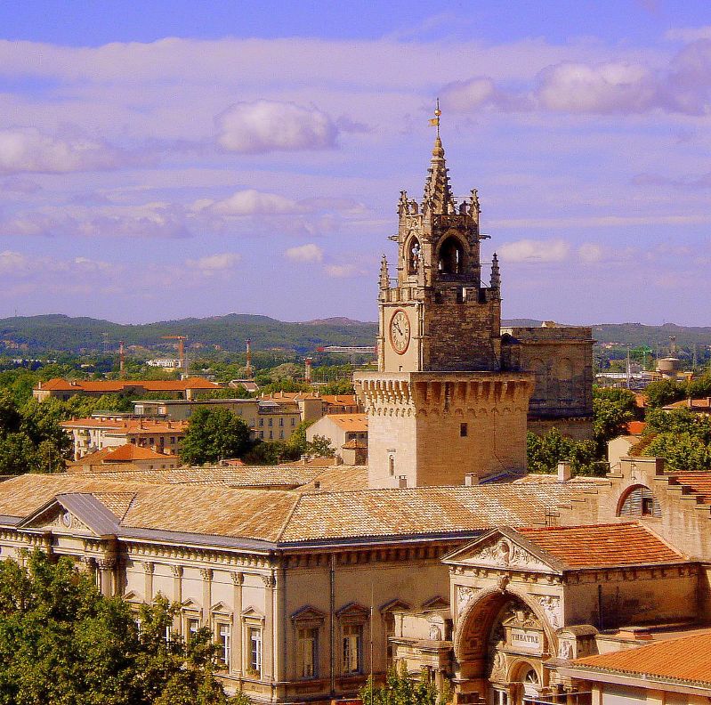 a large stone tower on top of a building