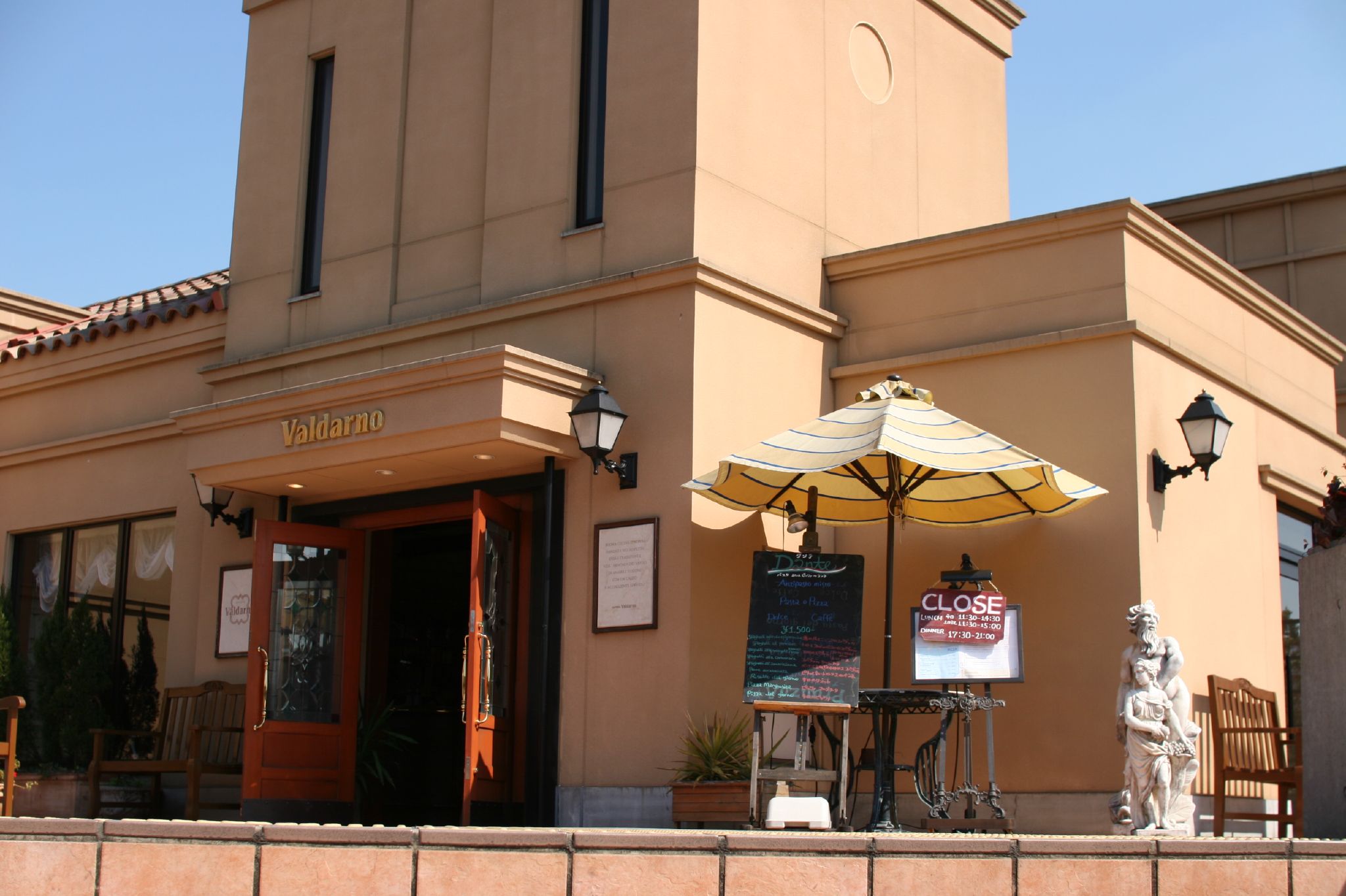 a building with a green umbrella is shown