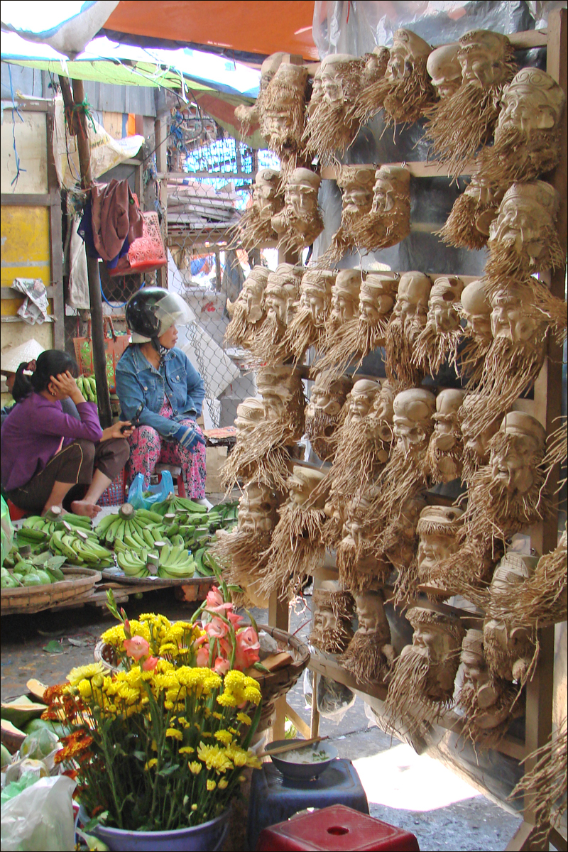 people looking for various items inside a market