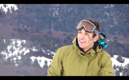 a man that has some snow in his hair