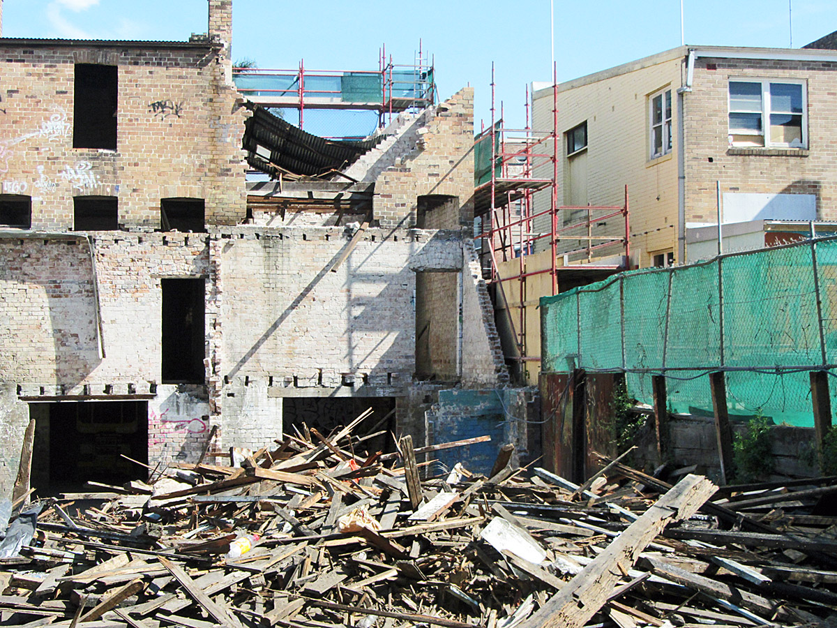 there is debris on the floor of a demolished building