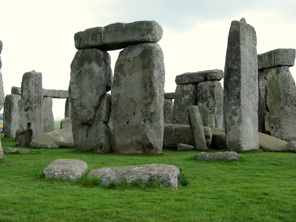 large stones arranged in a grassy field