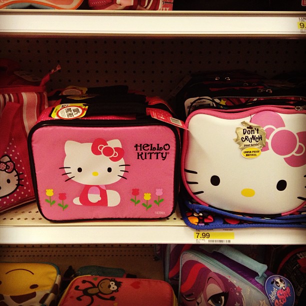 the children's luggage is on the shelves in a store