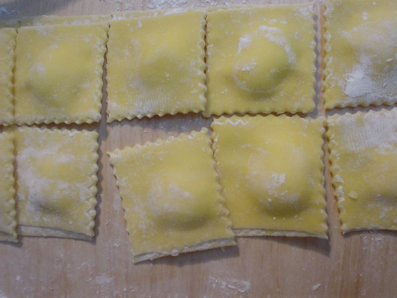 a table with slices of homemade pasta placed on top