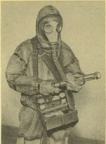 a man in scuba gear holds a tool case