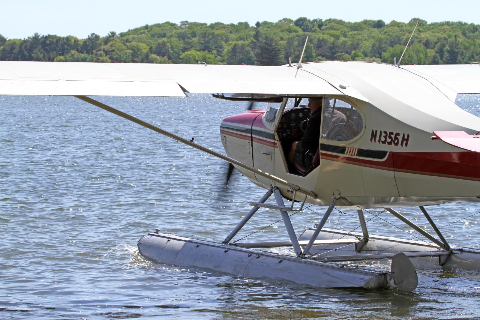 a water plane is out on the water