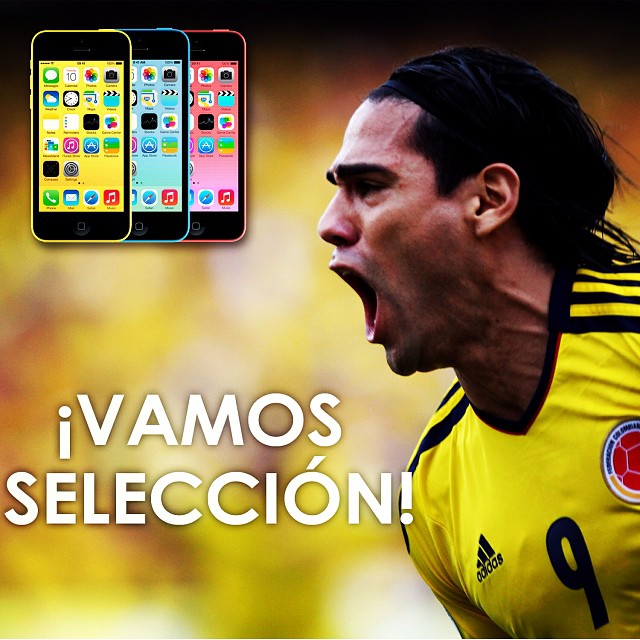 a man holding his mouth open showing his tongue and soccer players phone cases in the background