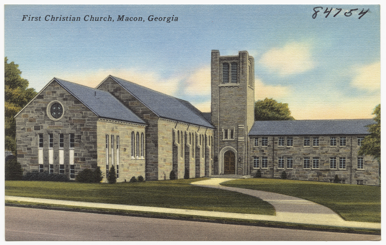 a postcard depicting the front and rear of a church