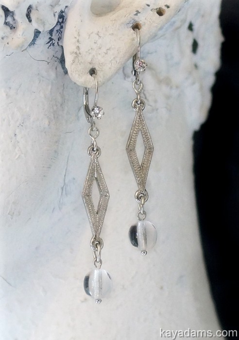 pair of silver plated crystal dangles and glass beads