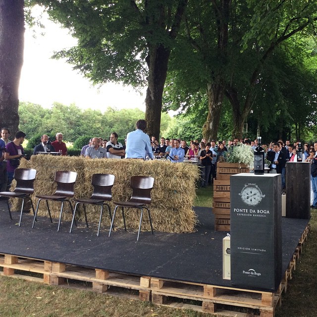 two stage with hay bales that have chairs on it