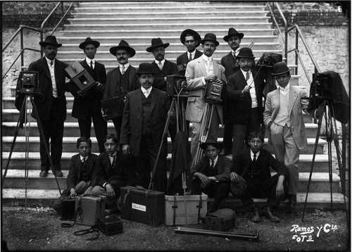 the men are posing for this picture with their instruments