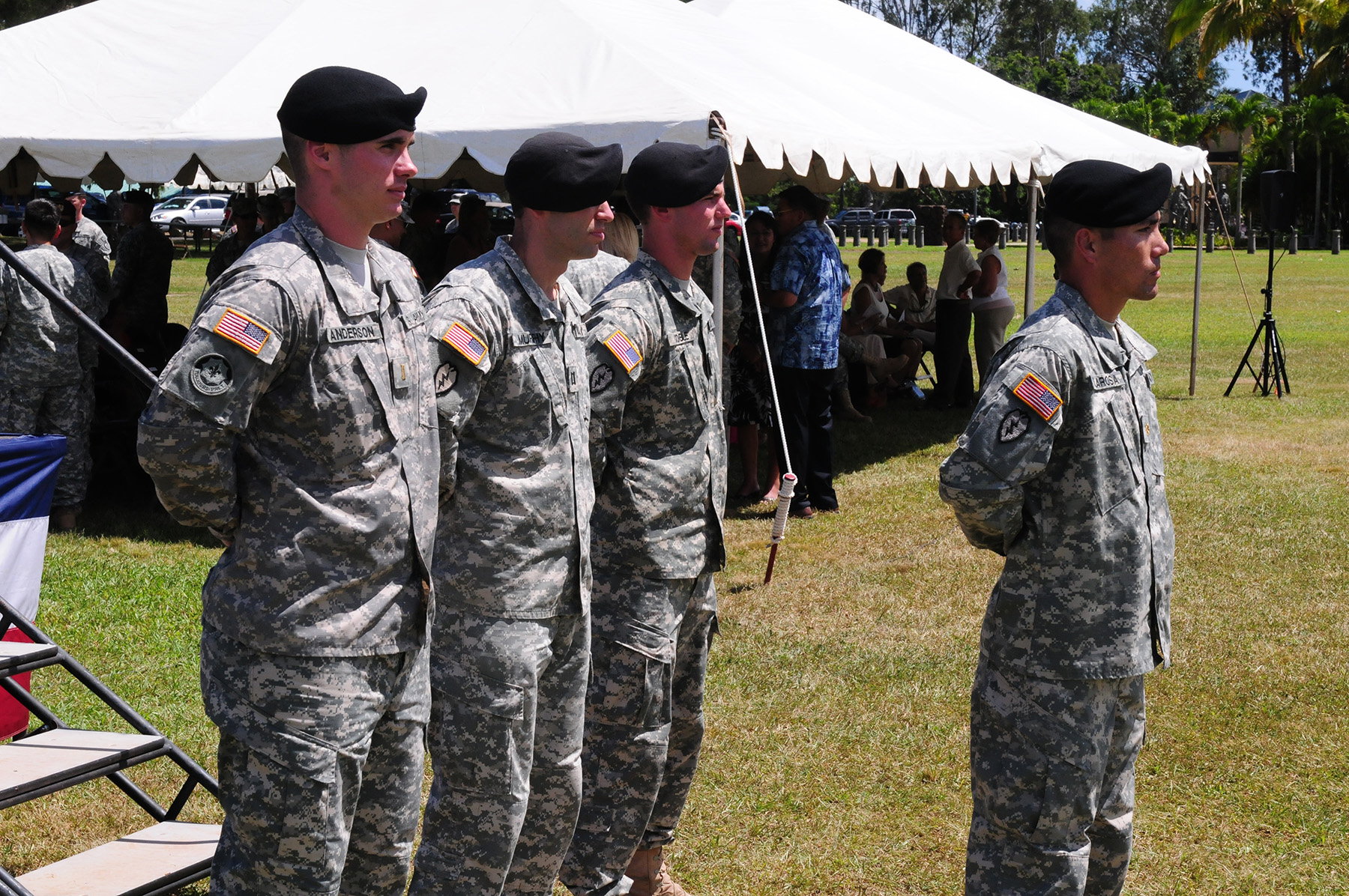 many men in military clothes standing together