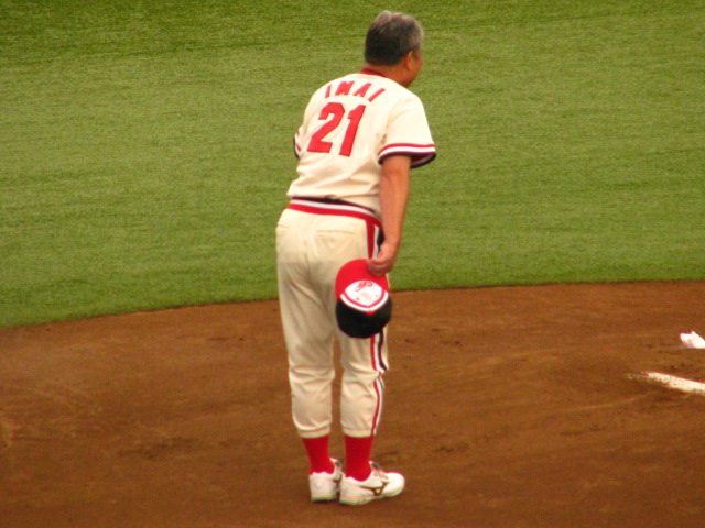 a baseball player at the home plate waiting for the next pitch