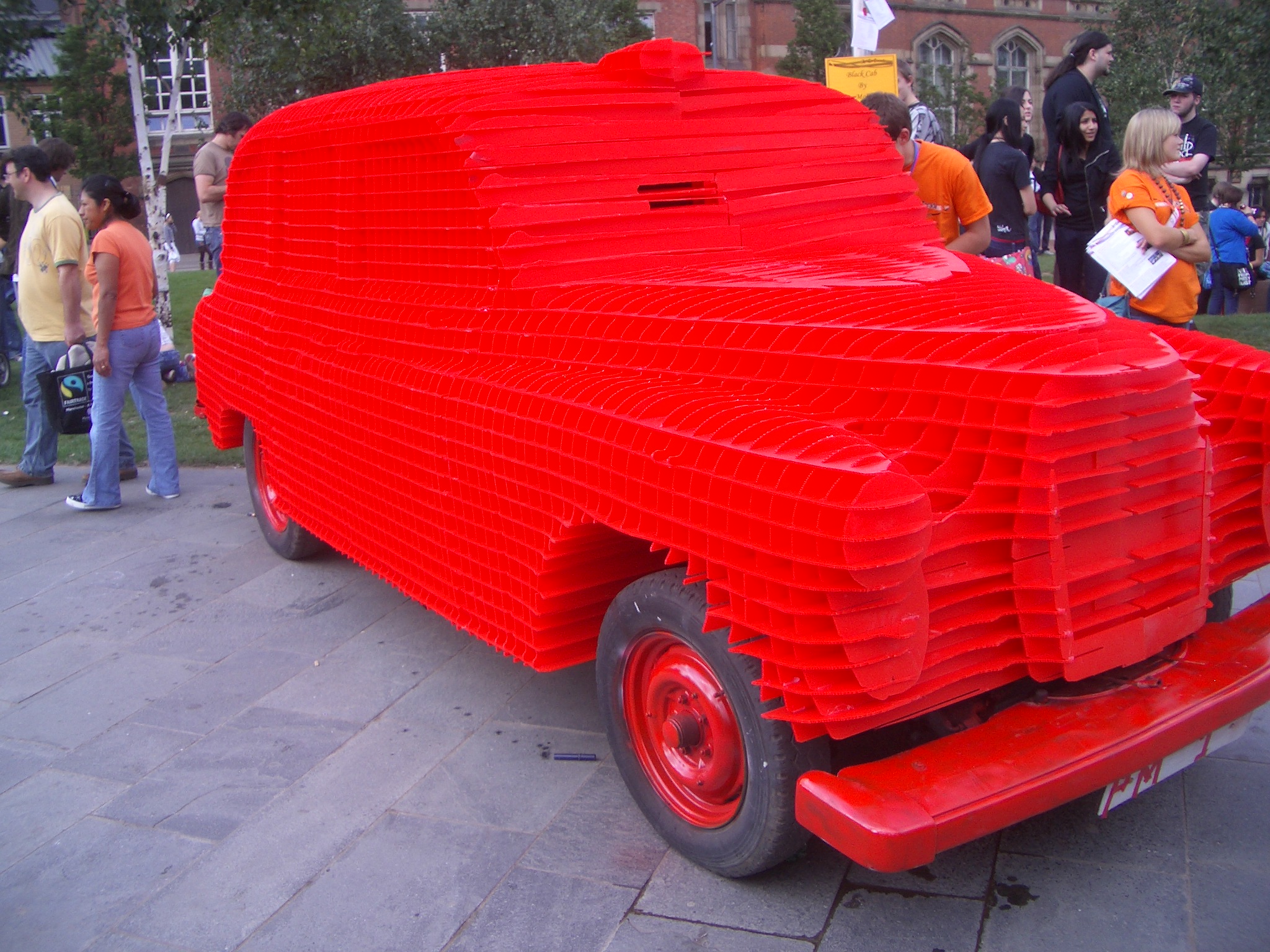 an unusual truck made of thousands of cups