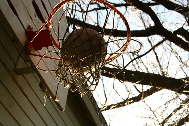 a basketball is placed in a basketball hoop