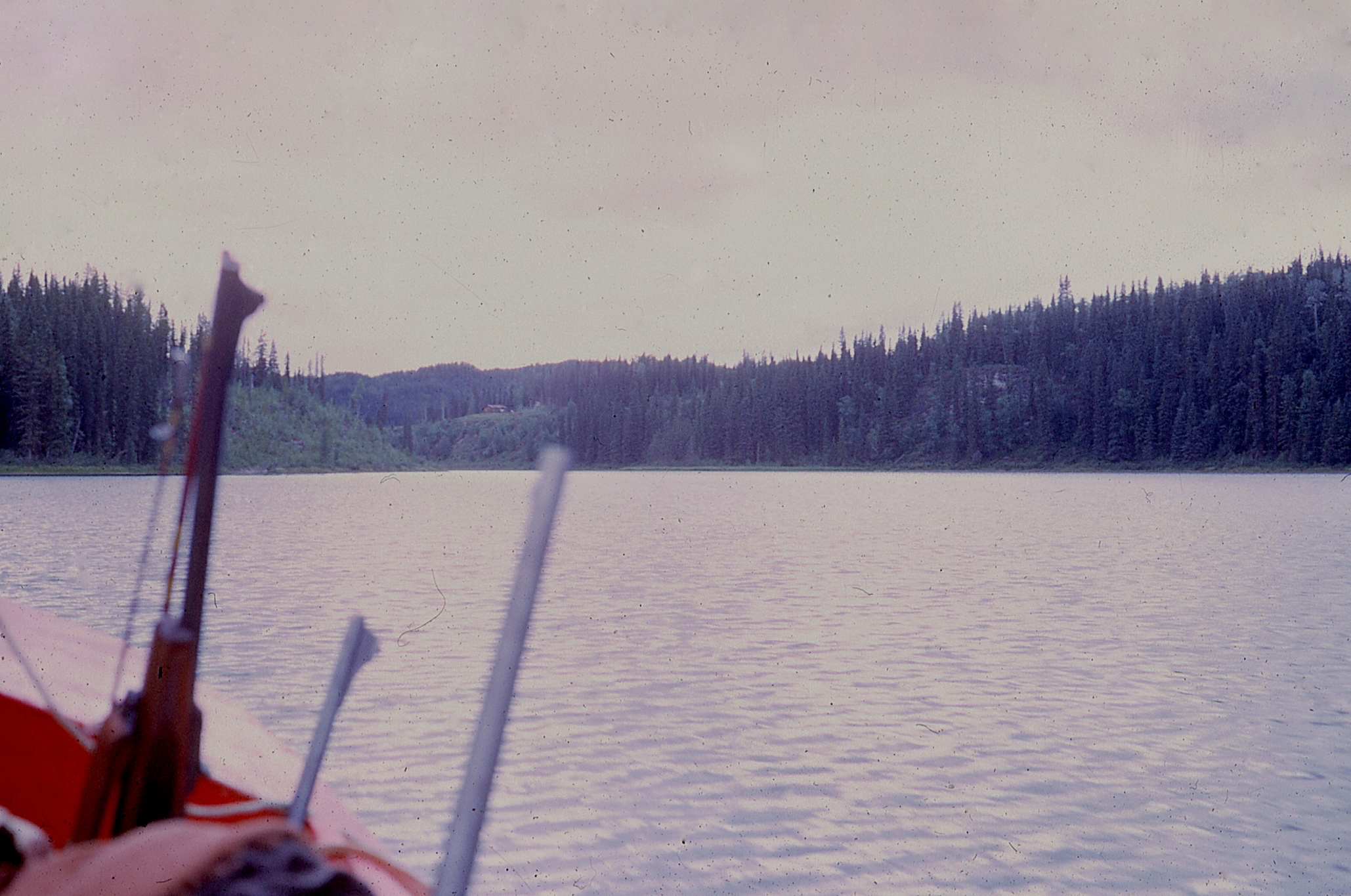 an old po of a canoe in the water