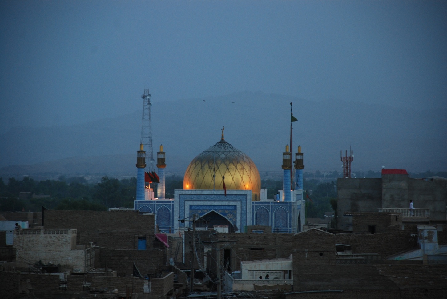 the dome of a building has bright lights on top