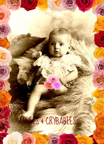 old pograph of a baby with flowers on it