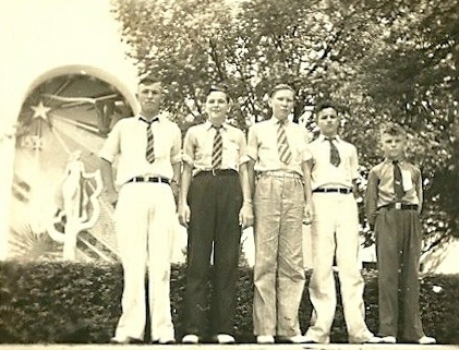 old fashioned picture of several boys posing for the camera