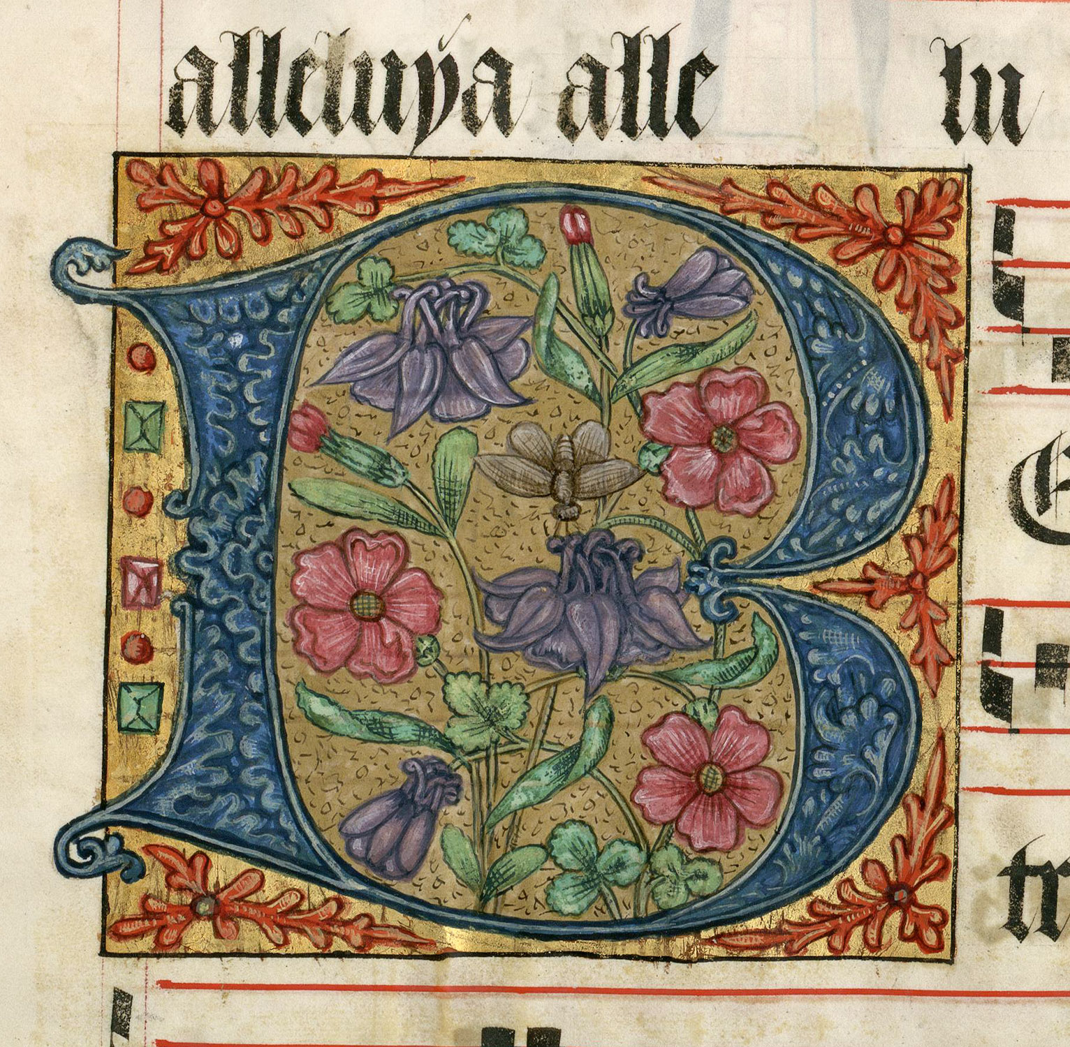 a medieval style book with a decorative flower design