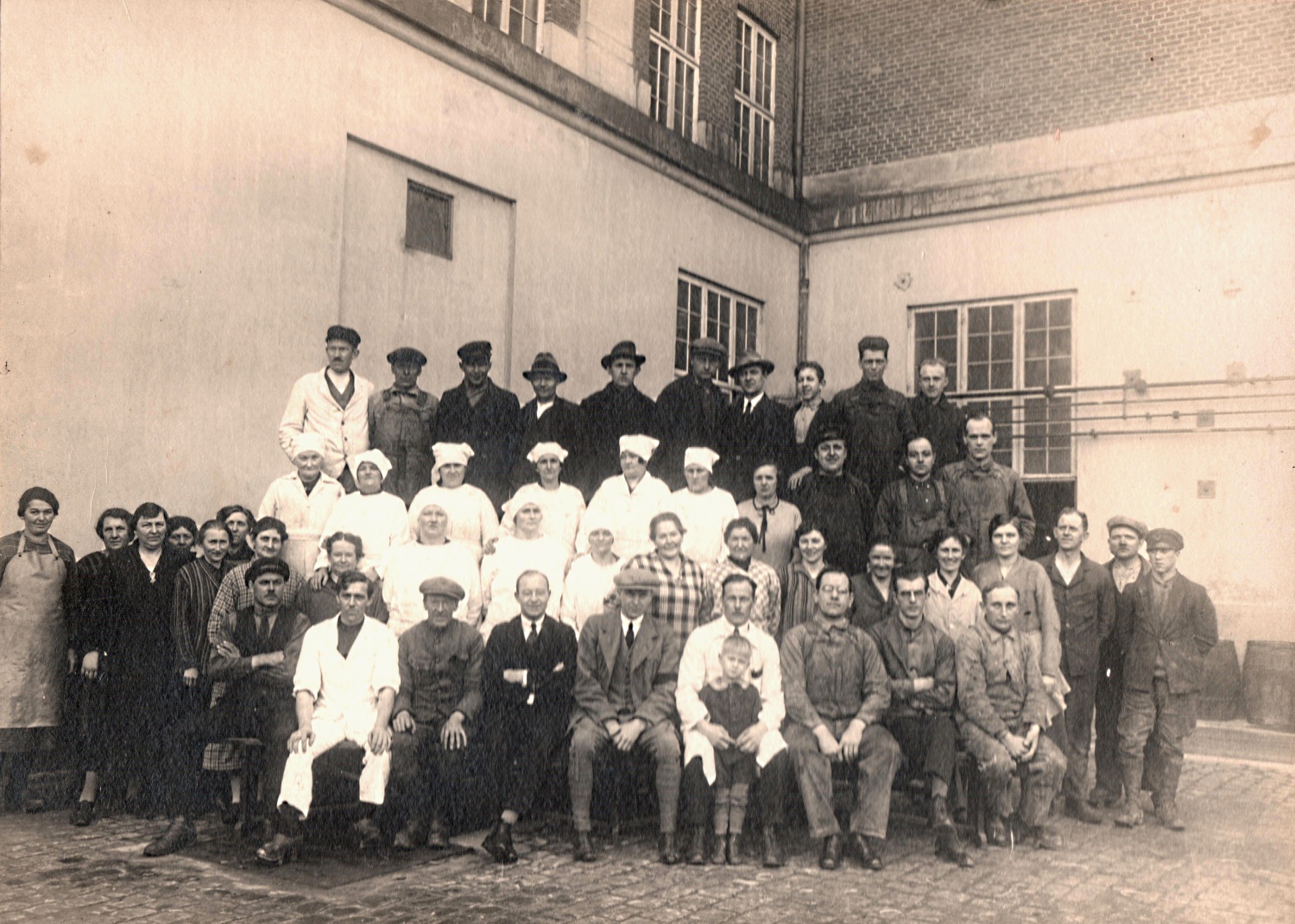 an old po shows people wearing hats and ties