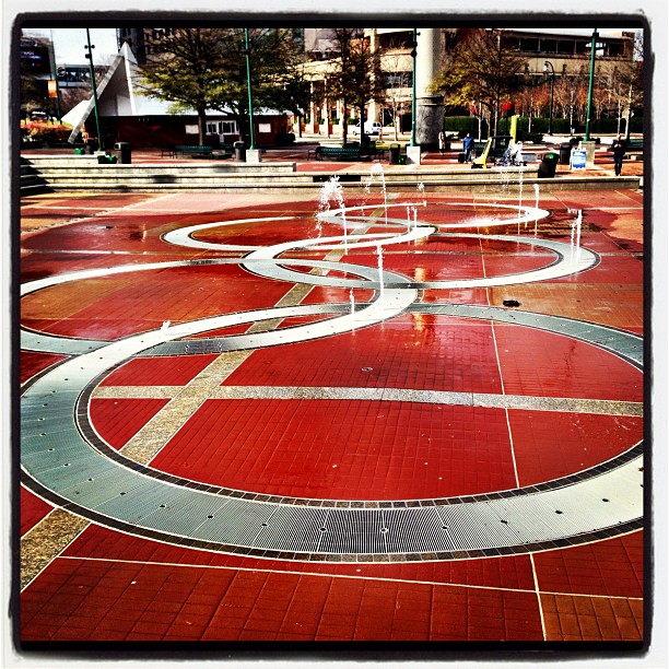 a park that has some colorful circular fountains