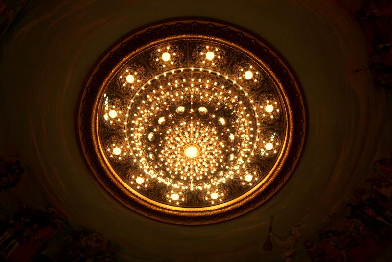 a round light fixture is lit up in the center