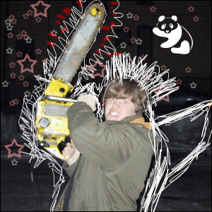 a person holding a chainsaw and smiling