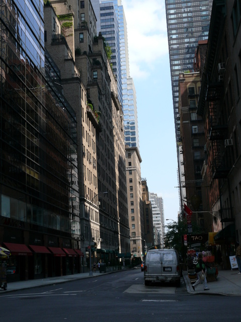 view of street from across the street in tall buildings