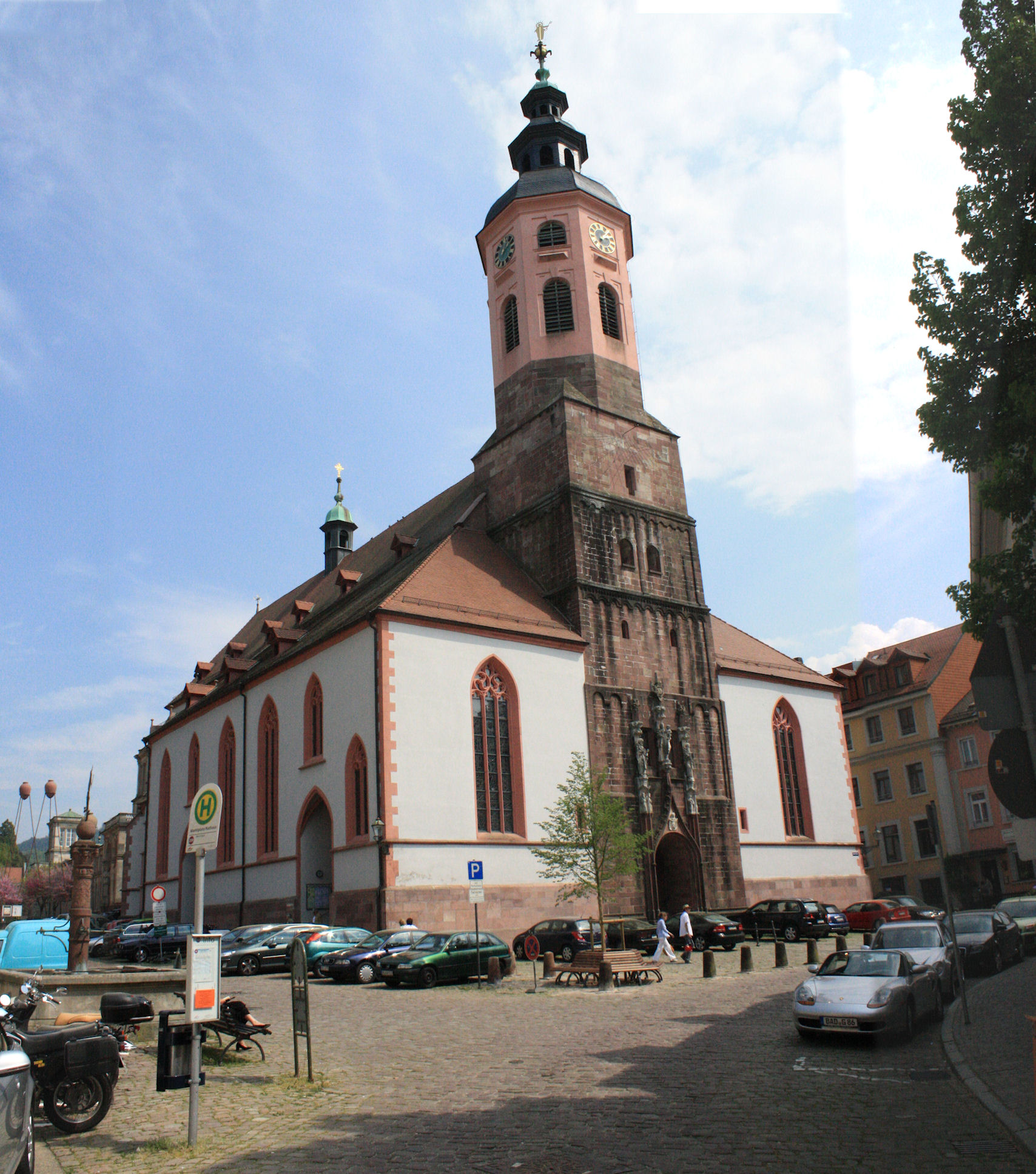 the old church is very tall and has a spire