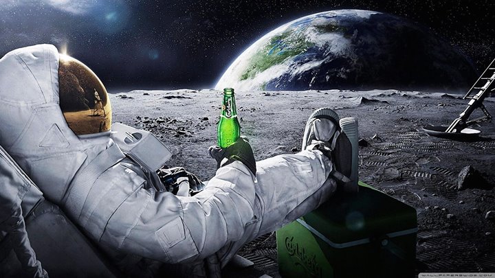 an astronaut sitting on the moon next to a beer