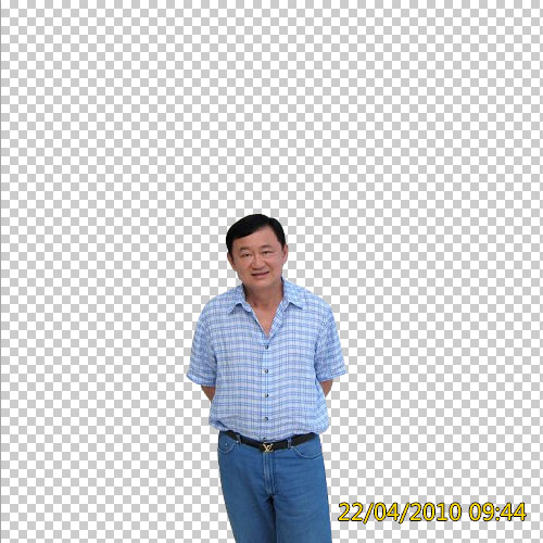 an older man standing and smiling for the camera