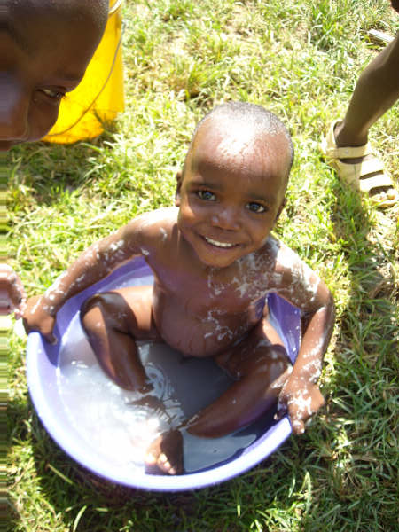 the children are playing in the water