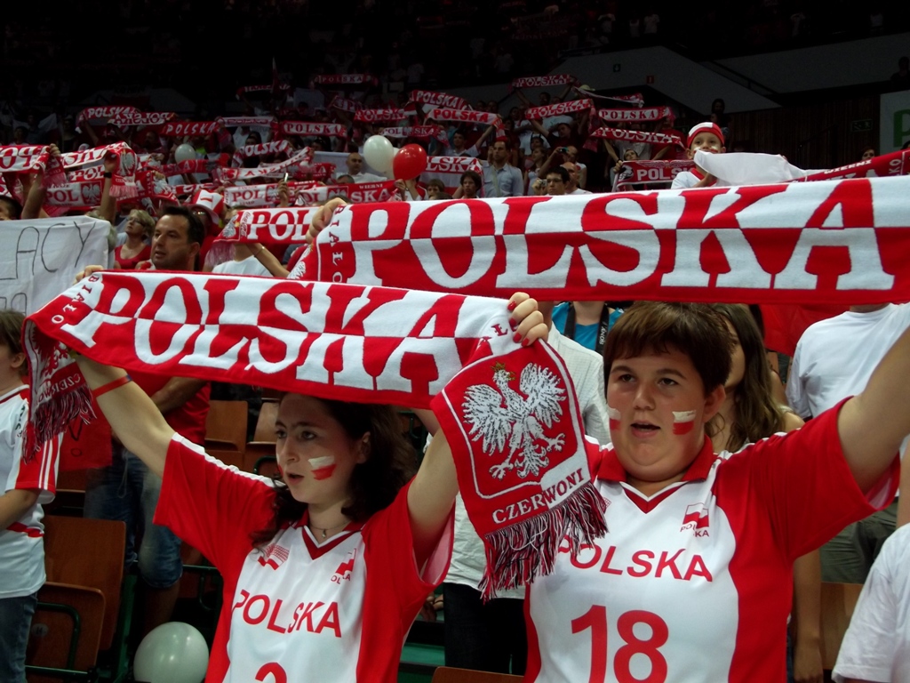 the fans are holding their scarfs with their names