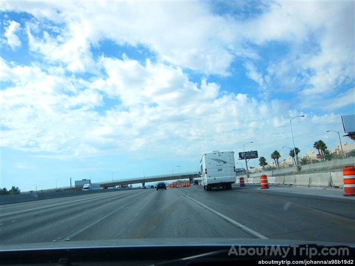 a highway is shown with construction cones in the front