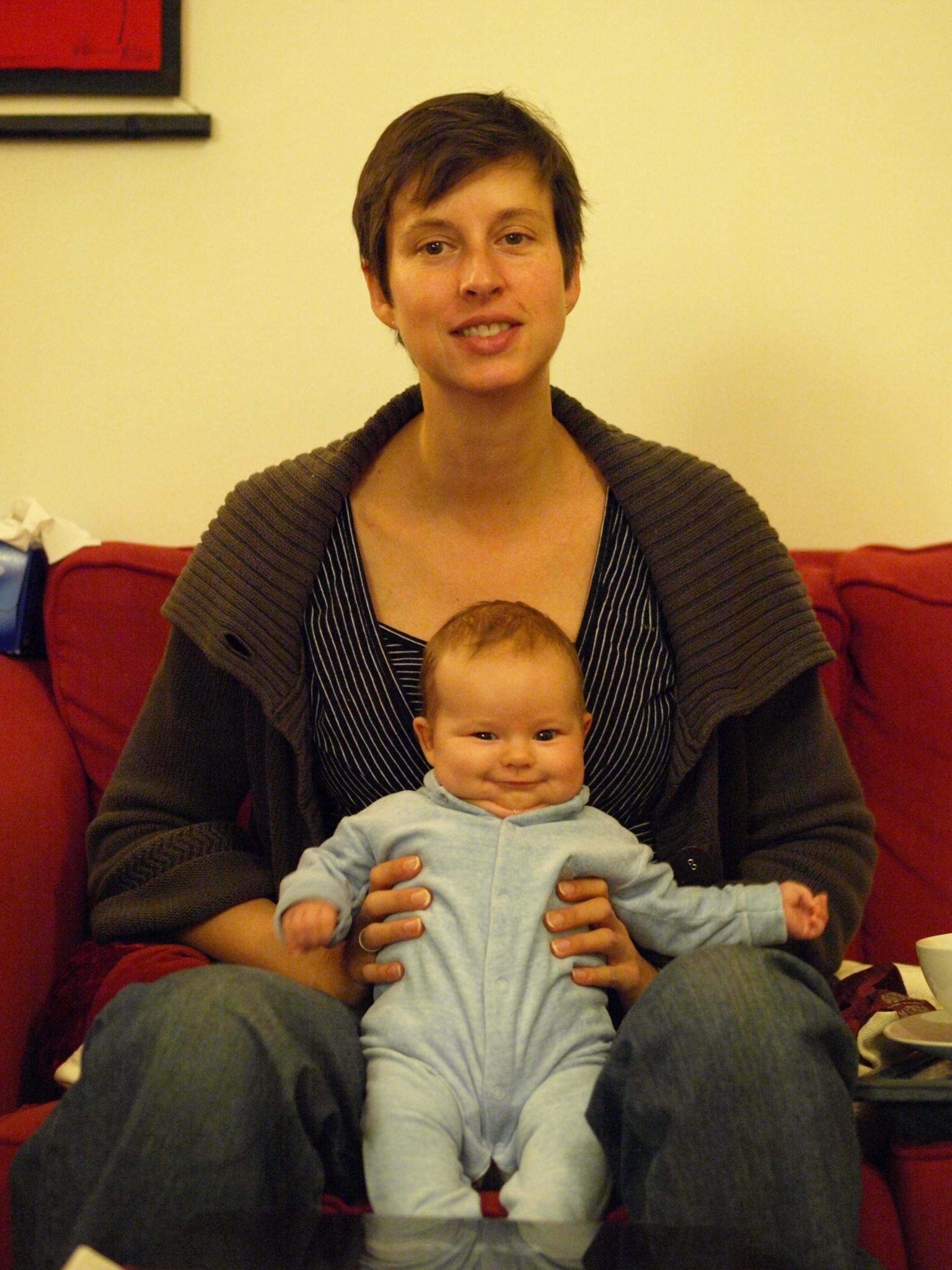 an image of a woman sitting with a baby