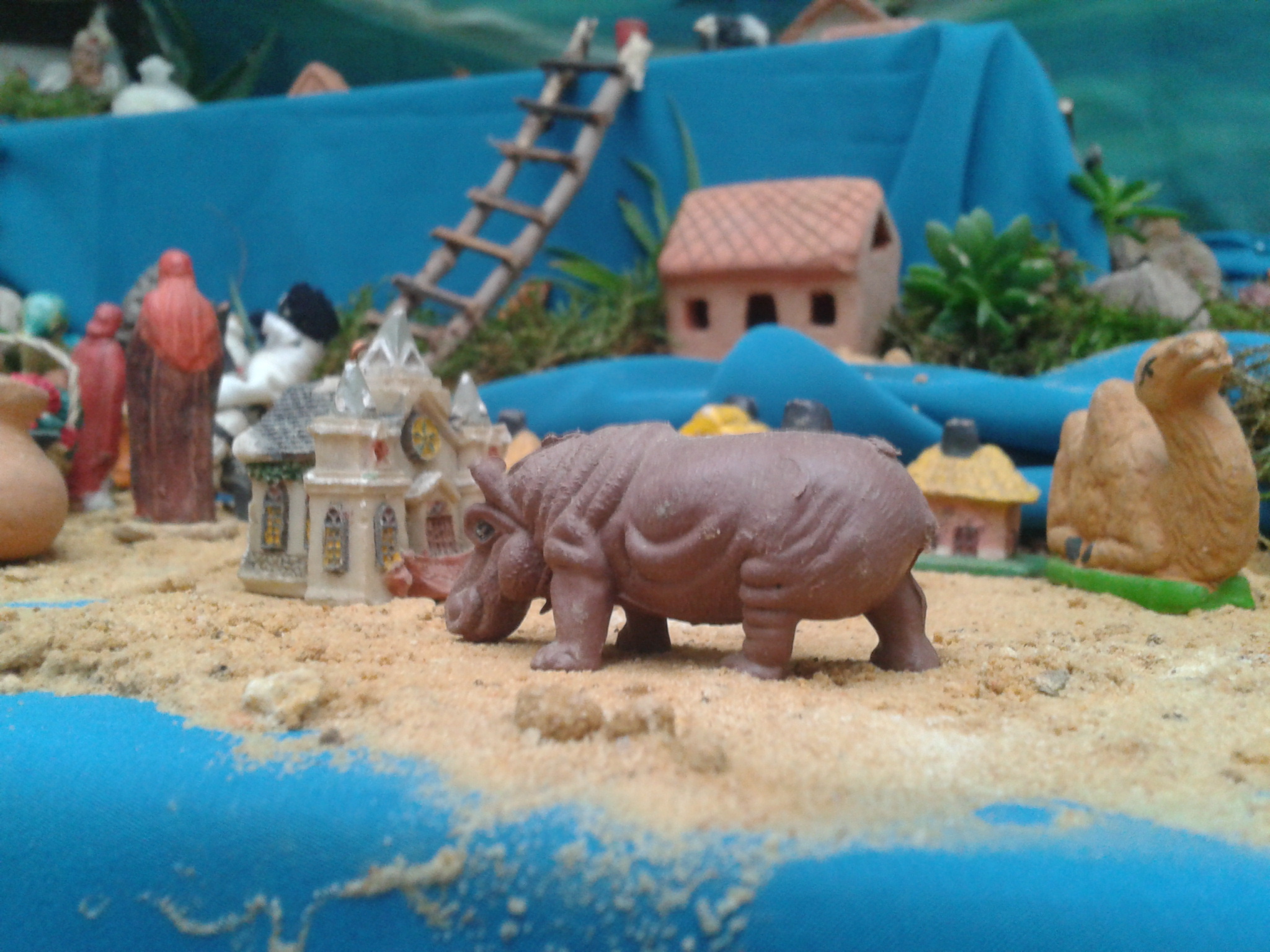 a small rhinoceros is in a toy display