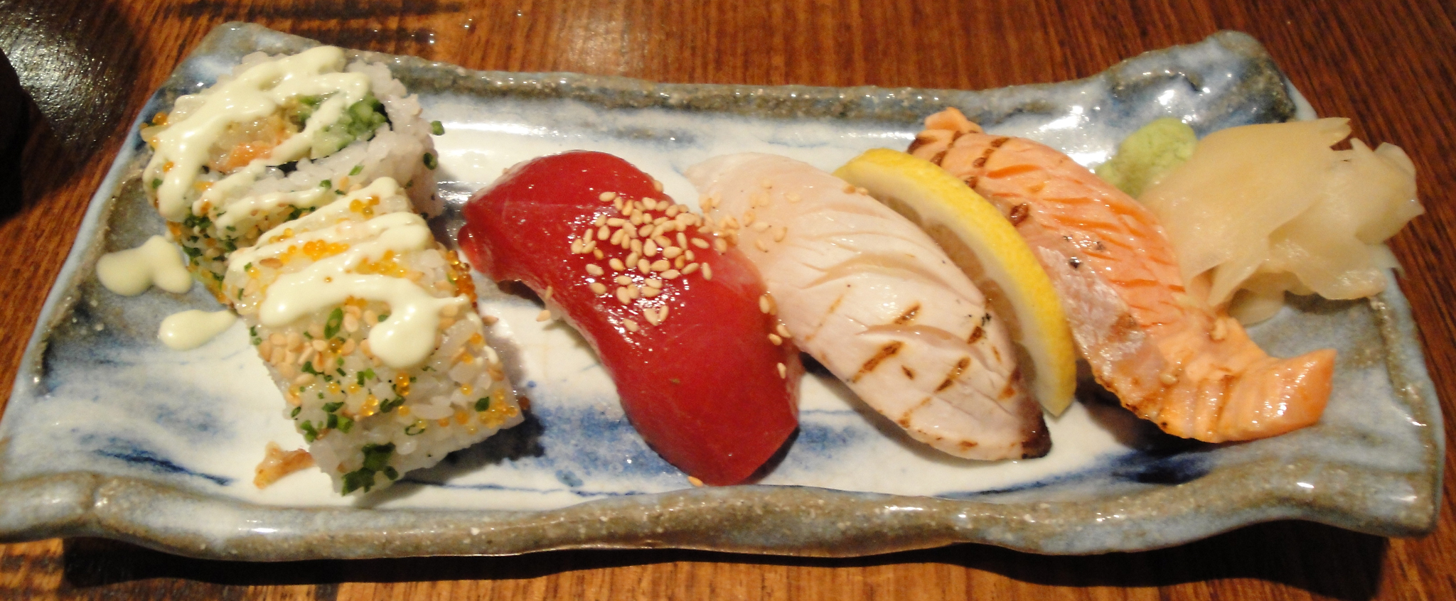 various food items served on a blue and white plate