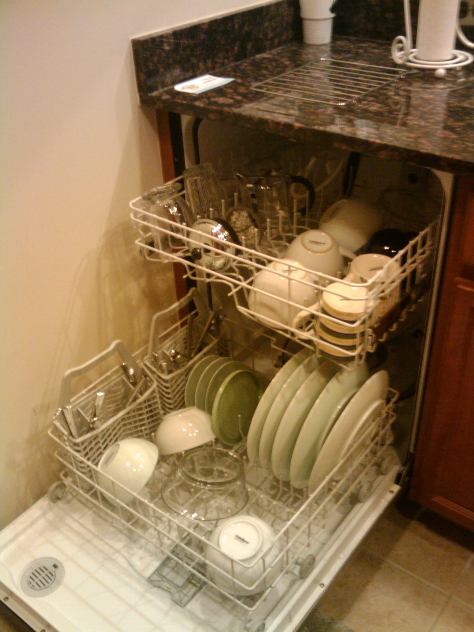 dishwashers are stacked in the small dish washer