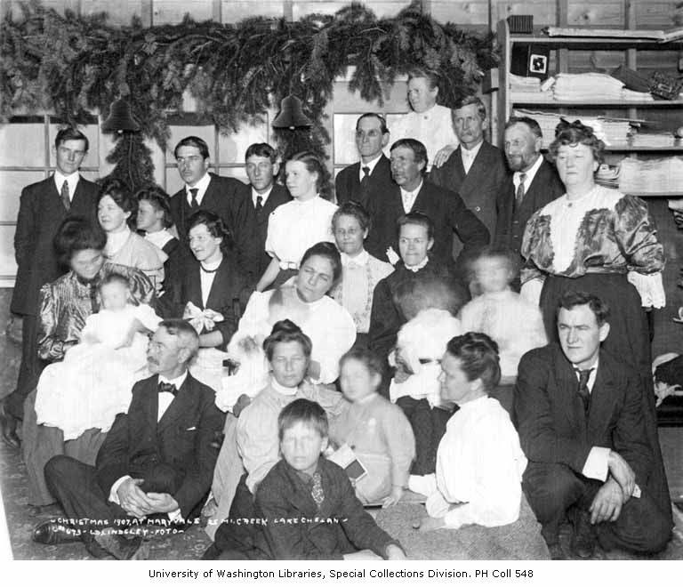 a vintage black and white po of several people