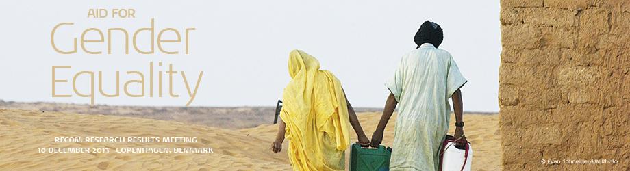 two women walk through a desert to the land