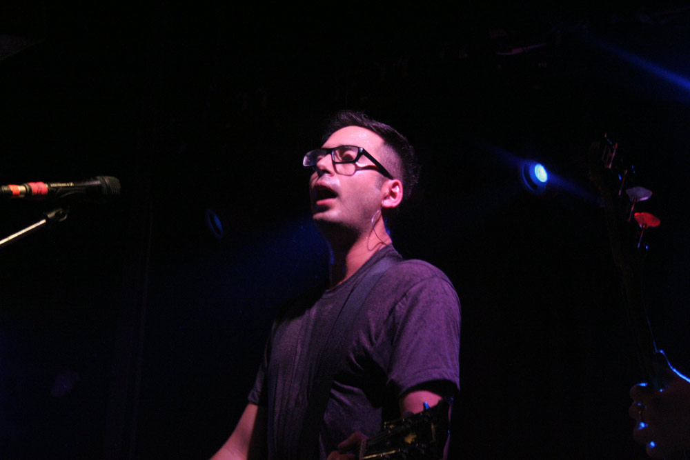 a person standing in front of a microphone