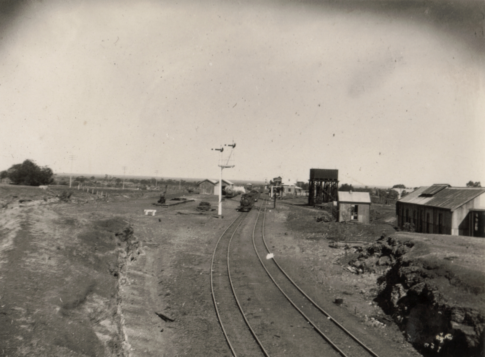 an old fashioned railroad track is on the outskirts