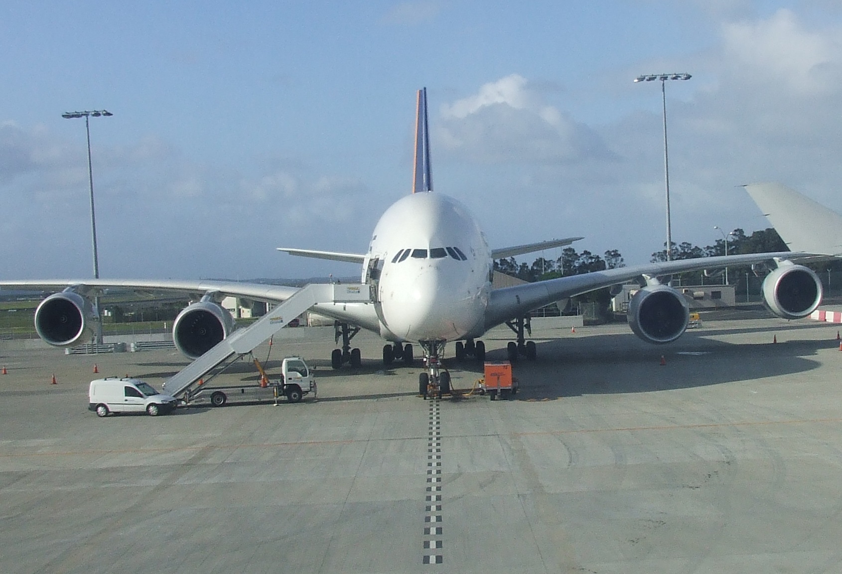 an airplane that is on the ground with propellers attached to it