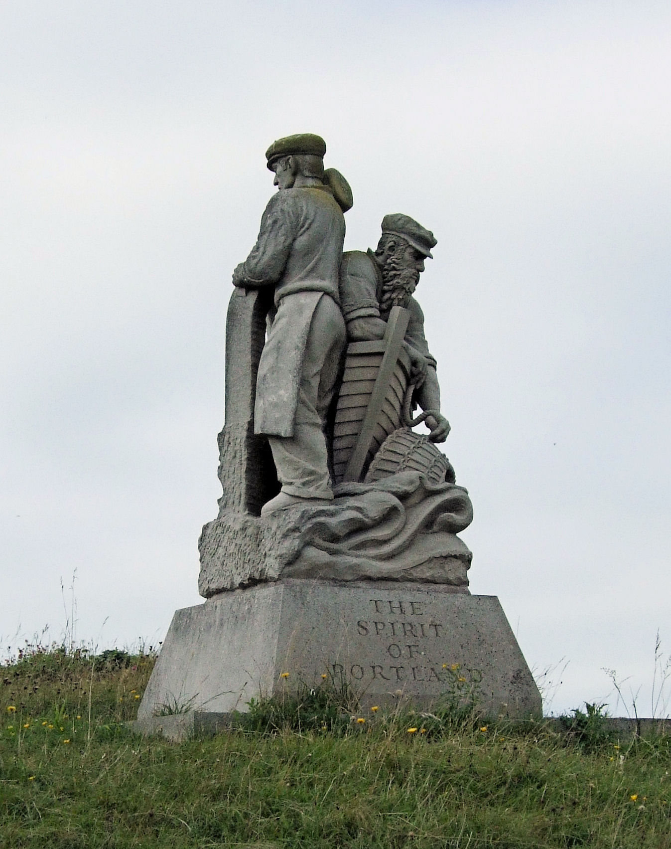 a statue with an american flag sticking out of its mouth