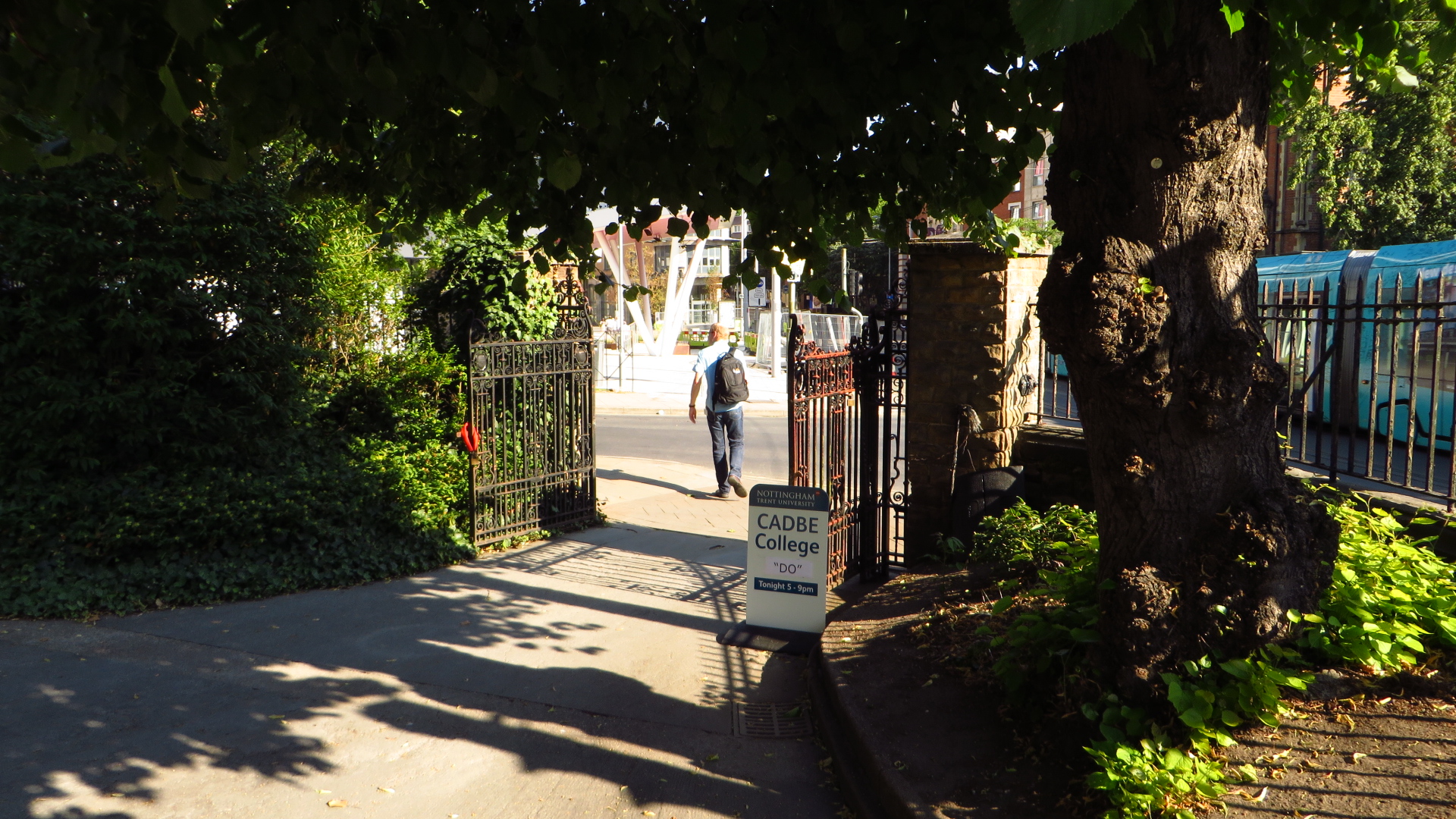 a man that is walking down a street