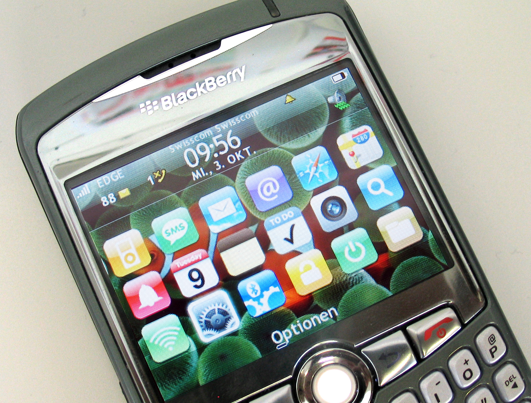 a cellphone has the theme blackberry on screen