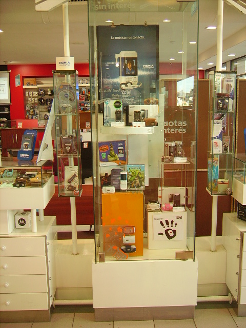 a display case inside of a store with electronics