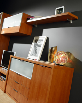 there is a television that is on top of a cabinet